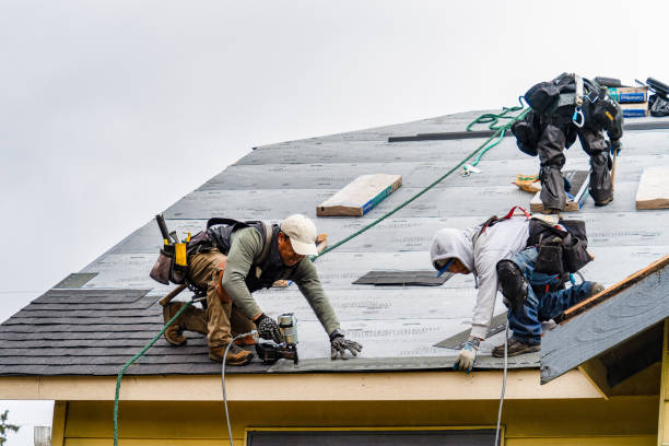 Professional Roofing technician working in Goshen, CT
